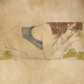 ÃÂ sensual woman, lying down that bites grapes of grapes